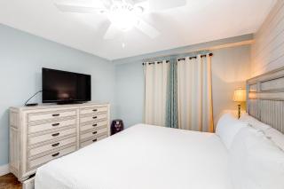 Ground-floor condo with large patio pools tennis & parking - steps to beach - 1