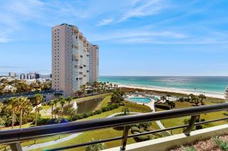 Cozy coastal condo with kitchen shared pool and beach access - 0