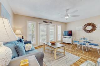 Bright open 3rd-floor condo with pool views from private balcony - next to beach - 5
