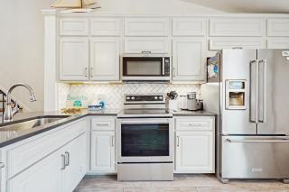 Perfectly located home with open layout, smart TVs, W&D & pools! - 1