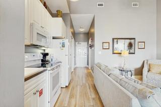 Spacious condo with large living area private balcony & shared pool - 1