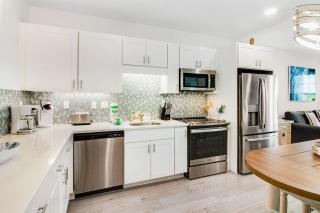 Newly built condo with WiFi shared pools hot tub & private beach access - 1