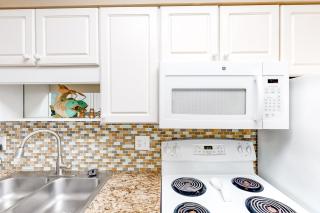 Updated beachfront condo with beach setup - quick drive to entertainment - 3