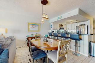 Beachfront condo with pool huge balcony W&D & central AC - drive to dining - 1