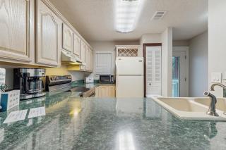 Cozy coastal condo full kitchen & close to beach access - 2