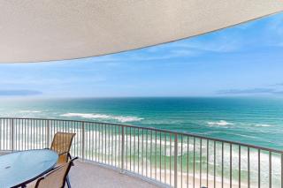 Spacious beachfront condo with full kitchen shared pool and beach access - 0