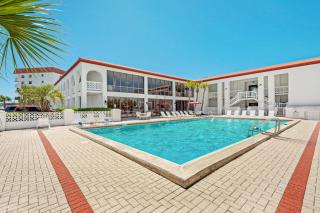 Cozy coastal escape condo with shared pool Beach access Gym and Sauna - 8