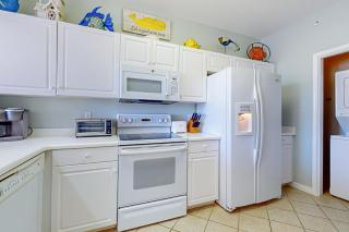 Lovely waterfront condo with pool hot tub fitness area & washer&dryer - 1