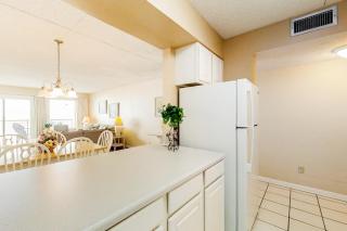 Updated beachfront condo with beach setup - quick drive to entertainment - 3