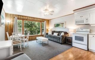 Ground Floor Riverside Cottage with Patio - 0