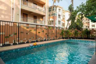AKD Home 2 BHK Apartment with Pool Gym Candolim - 8