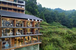 龙胜风云酒店 - 0