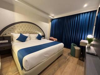 Grand Plaza Inn by RAK Rooms, Kannur - 4