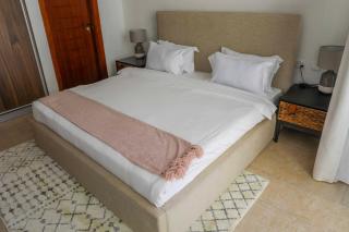 Imagine Luxe Bohemian 1 bedroom by YourHost, Kilimani - 1