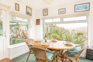 Longships looks across the cove of Portmellon - 6