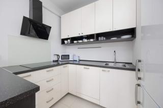 Modern Apartment in Warsaw with Parking and Balcony by Noclegi Renters - 7