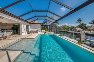 CoralVilla Aesthetic View - on water, pool, spa, boating, BBQ, tiki hut - 1