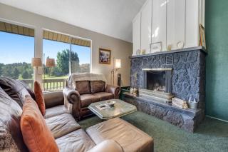 Refined home with a game room, balcony, grill, washer, dryer, & four bedrooms - 5