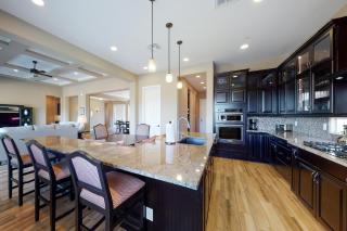 Southwestern stunner with enclosed yard, pool, putting green, & grill - 2