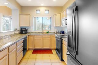 Sunny, dog-friendly condo with a heated pool, gym, grilling area, & golf nearby - 5