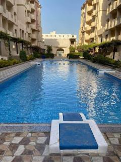 Cozy Studio with Balcony in Florenza Khamsin Resort -3 Pools and Prime Location in Eribia District - 8