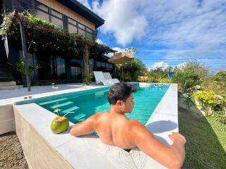 Black Glasshouse with overlooking view - 1