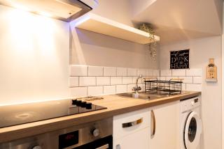 Modern Hideaway Sleek 2BR Apartment Private Garden Views - 9