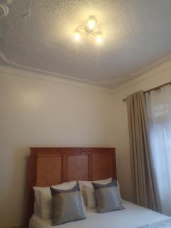 Two Bedrooms Apartment, located between kajjansi and kitende, with one bathroom, a living room, fully furnished kitchen, patio, free wifi, free parking space - 8