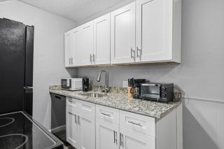 Roomy 1BR townhome with open living area - 1