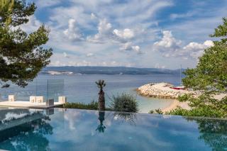 Seaside apartments with a swimming pool Medici, Omis - 25214 - 2
