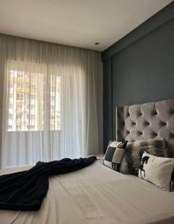 TIGMI Raha LABOU - 1