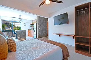 New apartment with communal pool steps from beach - 9