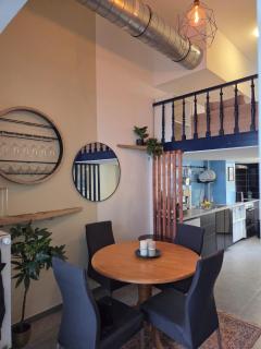 Industrial-Style Loft with Mezzanine Bedroom in Prime Area - 0