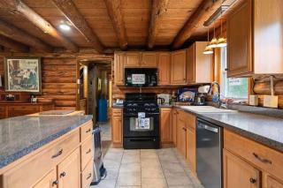 Cozy Log Cabin w Porch Fire Pit Games & River - 8