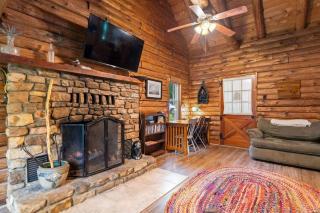 Cozy Log Cabin w Porch Fire Pit Games & River - 2