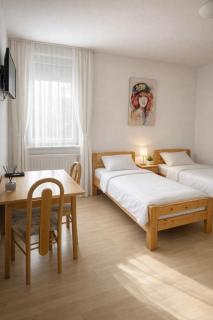 Rent2Stay Einzelzimmer mit privatem Bad - Smart-TV, WLAN, Parkplatz - 1