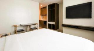 Capital O 804 The Residences at Bonifacio Civic Center - 2