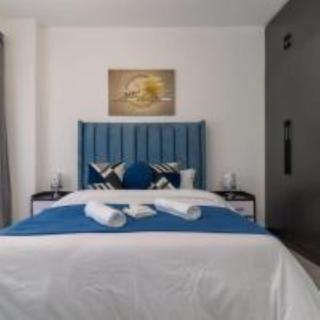 celestial stays two bedroom apartment with well equipped gym swimming pool and, ample parking space and proximity to major shopping malls - 7