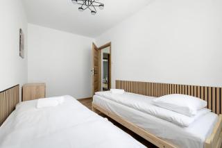 Modern Apartment with Balcony and Place for Remote work by Noclegi Renters - 1