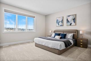 Carrington 4BR Home near Calgary Airport – Water Views, Games Room, Massage Chair, EV Garage - 2