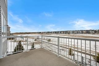 Carrington 4BR Home near Calgary Airport – Water Views, Games Room, Massage Chair, EV Garage - 1