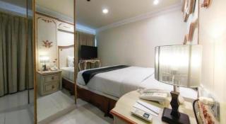 Amos Cozy Hotel Melawai - 8