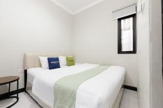 Urbanview Hotel at Pesona Guest House Jambi - 0