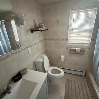 Luxury Beachside Escape in Seaside Heights 4BR 2BA Dual Kitchens and Living Rooms Fully Renovated Beach Badges Parking Outdoor Spa Shower - 7