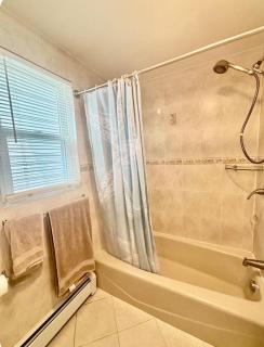 Luxury Beachside Escape in Seaside Heights 4BR 2BA Dual Kitchens and Living Rooms Fully Renovated Beach Badges Parking Outdoor Spa Shower - 4