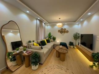 Boho 2BR Apartment with Garden View in El Rehab - 5