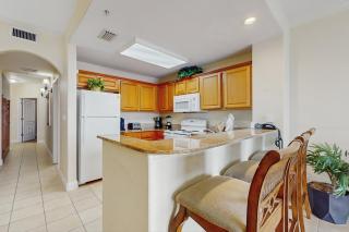 Lake-view 3rd-floor condo with hot tub, pools, balcony, shuttle service, & gyms - 8