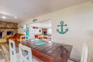 Lakefront home with water views, foosball, screened porch, & private W/D - 1