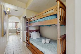 Lake-view 3rd-floor condo with hot tub, pools, balcony, shuttle service, & gyms - 1