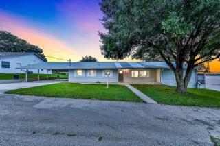 Dog-friendly lakefront home with fast WiFi, central AC, patio, & game room - 0